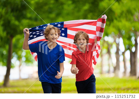 USA team supporter. American child with flag. 115251732