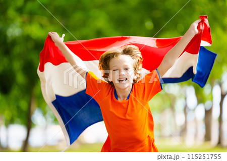 Netherlands team supporter. Dutch kid with flag. Netherlands team supporter. Dutch kid with flag. 115251755