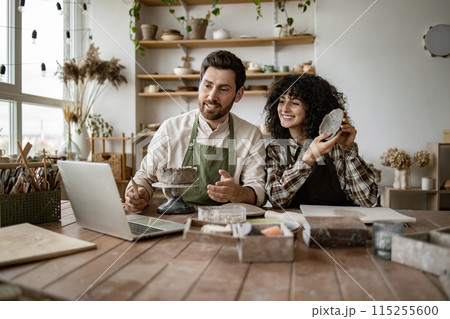 Couple creating pottery for online video tutorial or social media Couple creating pottery for online video tutorial or social media 115255600