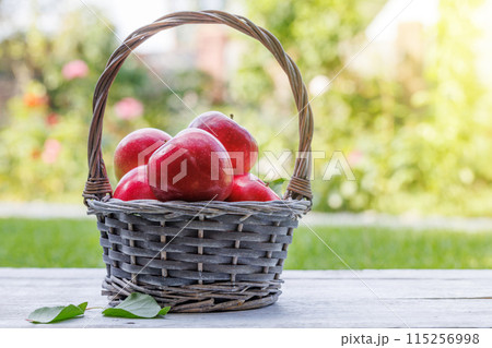 Basket with fresh red apples Basket with fresh red apples 115256998