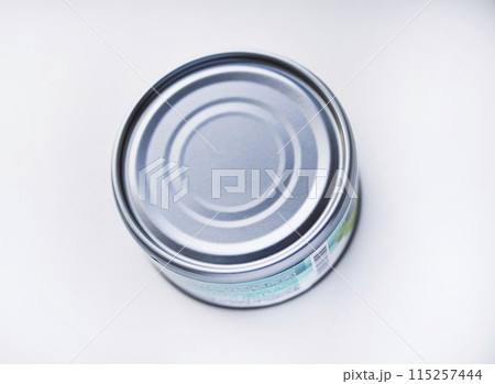 A tin can on a white background. A tin can. 115257444