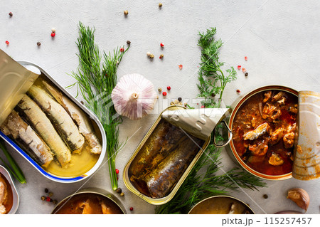Open tin cans with canned fish 115257457