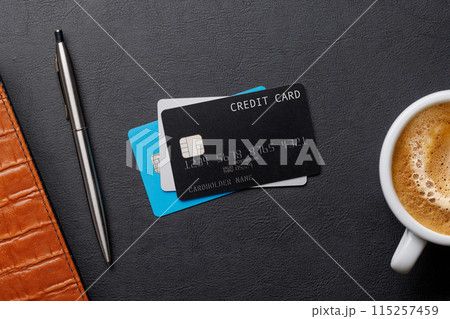 Black credit card on office table 115257459