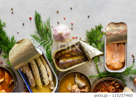 Open tin cans with canned fish 115257460