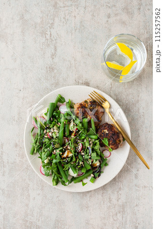 Salad with arugula and asparagus beans 115257562