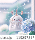 雨降る窓辺のてるてる坊主 115257847