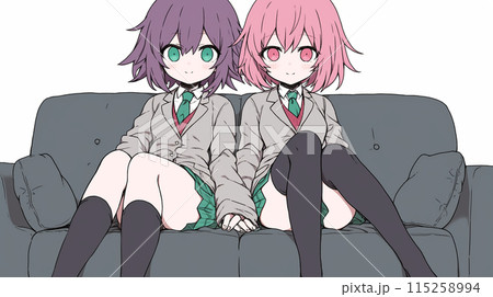 仲の良い二人の女子高生がソファーに座って手をつないでいる：LGBT
