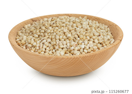 Sorghum seeds in wooden bowl isolated on white background with full depth of field. Sorghum seeds in wooden bowl isolated on white background with full depth of field. 115260677