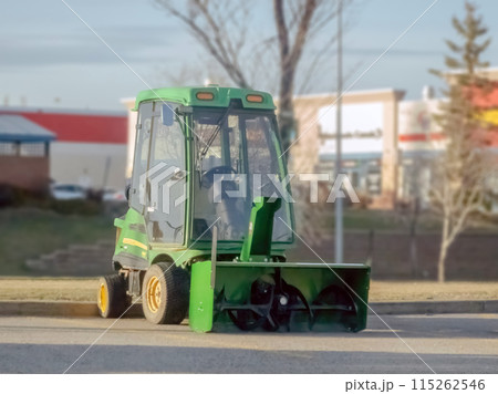 Calgary, Alberta, Canada. May 3, 2024. A John Deere Snow Blower. 115262546