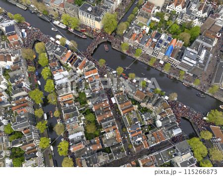 Kings Day 2024 in Amsterdam. Koningsdag, Koeningsdag in Capital of the Netherlands, Aerial Drone Fly Over Orange Suits. Kings Day 2024 in Amsterdam. Koningsdag, Koeningsdag in Capital of the Netherlands, Aerial Drone Fly Over Orange Suits. 115266873