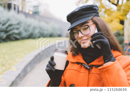 A woman in a black hat 115268630