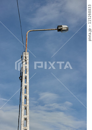 Lamp post on a street 115268833