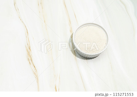 Backdrop Celtic Gray Sea Salt In A White Ceramic Bowl On Granite Table. Natural, Unrefined Salt Harvested From Brittany, France. Copy Space. Natural Minerals, Trace Elements, Superfood. Horizontal 115271553
