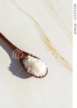 Mockup Baja Salt, Kosher Mineral Unrefined Sea Salt in Wooden Table Spoon, Natural Grain Crystals, Copy Space for Text. Granite Table on Background. Vertical, Template Mockup Baja Salt, Kosher Mineral Unrefined Sea Salt in Wooden Table Spoon, Natural Grain Crystals, Copy Space for Text. Granite Table on Background. Vertical, Template 115272164