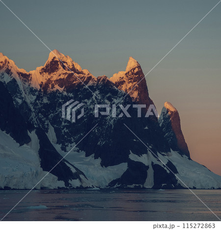 Lemaire strait coastal landscape, mountains and icebergs, Antarctic Peninsula, Antartica. 115272863