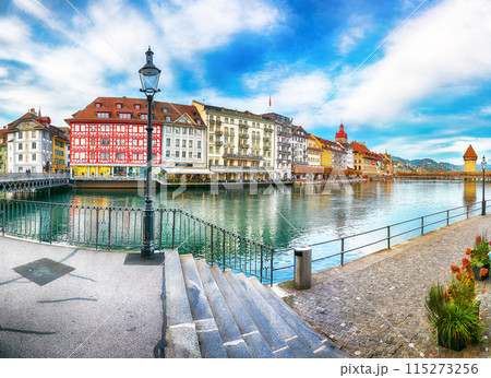 Breathtaking historic city center of Lucerne with famous buildings and old wooden Chapel Bridge (Kapellbrucke). 115273256