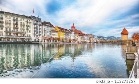 Breathtaking historic city center of Lucerne with famous buildings and old wooden Chapel Bridge (Kapellbrucke). 115273257