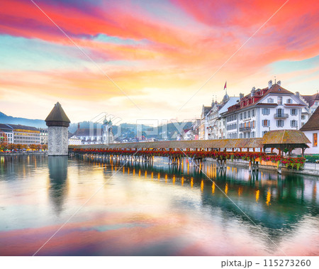 Breathtaking historic city center of Lucerne with famous buildings and old wooden Chapel Bridge (Kapellbrucke) Breathtaking historic city center of Lucerne with famous buildings and old wooden Chapel Bridge (Kapellbrucke) 115273260