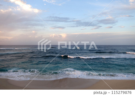 Waves break and crash towards the Hanakailio Beach 115279876