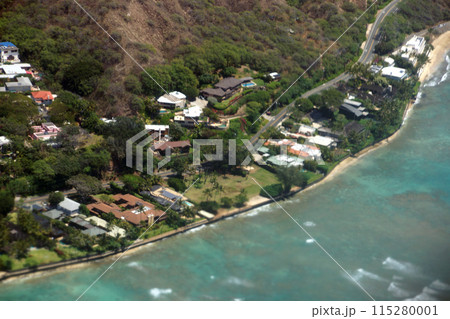 Aerial view of slopes of Diamond Head crater leading to the sea 115280001
