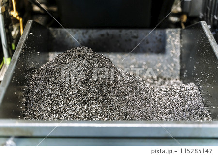 Metal shavings and waste in production. Waste metal in a factory 115285147