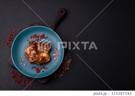 Delicious juicy chicken steak with salt, spices and herbs 115287142