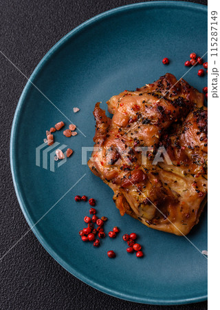 Delicious juicy chicken steak with salt, spices and herbs Delicious juicy chicken steak with salt, spices and herbs 115287149