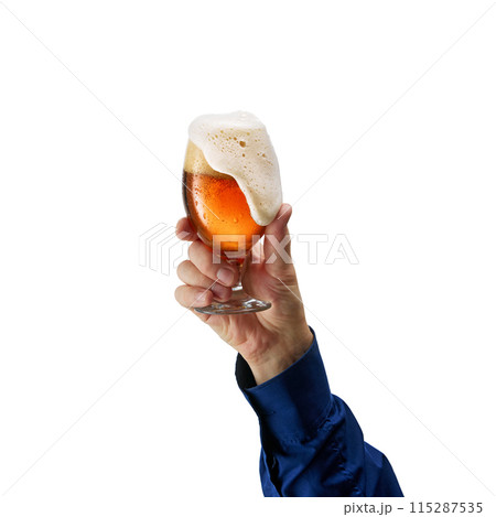 Frosted Beer Glass. Male hand holding lager foamy beer isolated on white background. Refreshment. 115287535