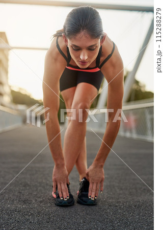Fitness, woman and stretch legs on bridge for sports training or workout as athlete for health or wellness. Young, active female and warm up with sneakers for marathon with exercise or cardio in city Fitness, woman and stretch legs on bridge for sports training or workout as athlete for health or wellness. Young, active female and warm up with sneakers for marathon with exercise or cardio in city 115288279