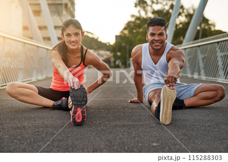 Fitness, portrait and couple stretch on bridge for health, wellness or warmup for run. Man, woman and training on road for cardio, preparation and workout together in city for marathon, jog or sprint Fitness, portrait and couple stretch on bridge for health, wellness or warmup for run. Man, woman and training on road for cardio, preparation and workout together in city for marathon, jog or sprint 115288303
