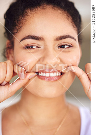 Smile, floss and woman with cleaning teeth routine for morning dental health or wellness for gums. Happy, dentistry and female person with oral care product for hygiene treatment to prevent cavity. Smile, floss and woman with cleaning teeth routine for morning dental health or wellness for gums. Happy, dentistry and female person with oral care product for hygiene treatment to prevent cavity. 115288997