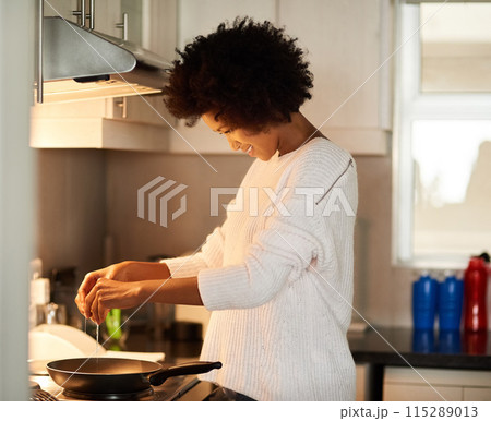 Breakfast, cooking and egg with black woman in kitchen of home for diet, health or nutrition. Food, pan and stove with afro person in apartment to prepare morning meal for hunger or wellness Breakfast, cooking and egg with black woman in kitchen of home for diet, health or nutrition. Food, pan and stove with afro person in apartment to prepare morning meal for hunger or wellness 115289013