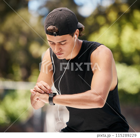 Watch, man and check fitness with music for cardio exercise training in nature park. Audio motivation lifestyle, sports workout and person monitor running speed on digital tech smartwatch outdoors 115289229