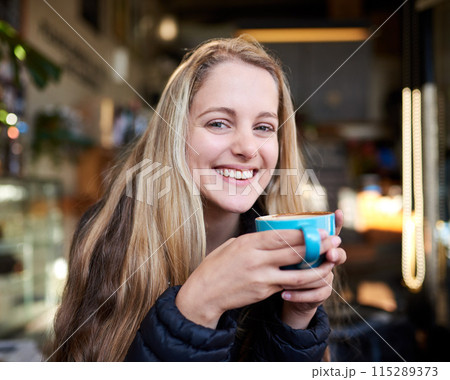 Portrait, laughing or happy woman with coffee in cafe to relax, chill and enjoy warm beverage in Germany. Cappuccino latte, smile or face of girl on break with tea, caffeine or hot chocolate in diner 115289373