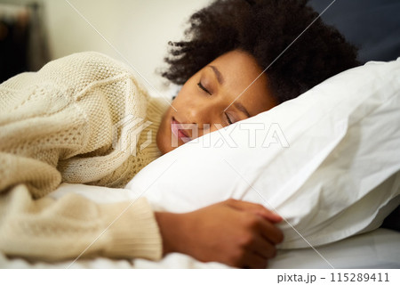 Face, relax and sleep with black woman on bed in morning of weekend for break, dream or nap. Calm, peace and quiet with afro person eyes closed in bedroom of apartment for comfortable time off 115289411