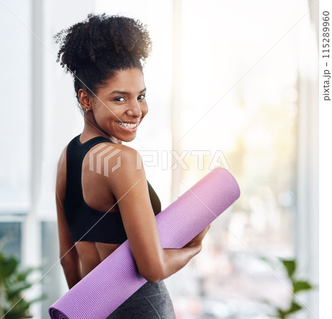 Black woman, smile and pilates or yoga mat in portrait ready for health, wellness or exercise and workout. Female person, happy and excited in gym class for cardio, fitness and training or holistic 115289960