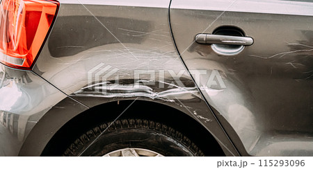 Broken Scratched Bumper Luxury Car Scratched With Deep Damage To Paint. Abandoned Car After Accident In Street 115293096