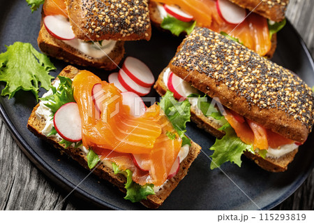 smoked salmon sandwiches on rye bread rolls smoked salmon sandwiches on rye bread rolls 115293819