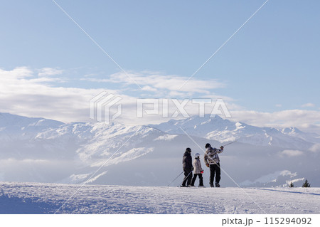 man and woman skiing and snowboarding in the mountains man and woman skiing and snowboarding in the mountains 115294092