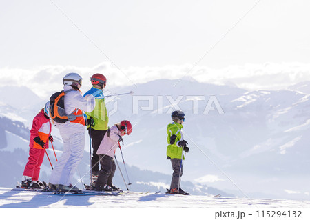 man and woman skiing and snowboarding in the mountains 115294132