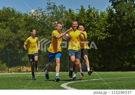 Joyful Victory Celebration. Group of young boys in bright yellow jerseys celebrating successful game on soccer field, sharing moment of triumph 115296337