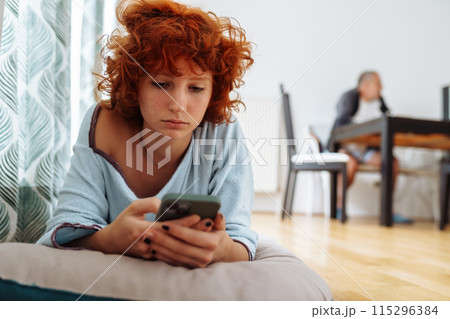 Portrait dreaming red-haired attractive teenager girl Portrait dreaming red-haired attractive teenager girl 115296384