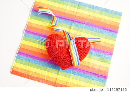 Red heart with rainbow color ribbon flag isolated on white background with clipping path, LGBT symbol. Red heart with rainbow color ribbon flag isolated on white background with clipping path, LGBT symbol. 115297126