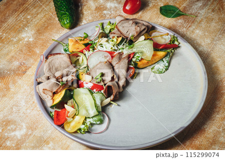 Bounty of Nature: Vibrant Vegetable and Succulent Meat Medley on Rustic Table Bounty of Nature: Vibrant Vegetable and Succulent Meat Medley on Rustic Table 115299074