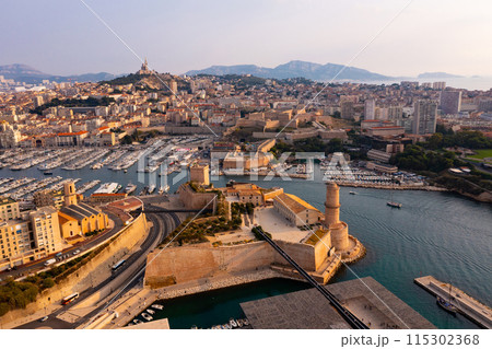 View from drone to Mediterranean seascape with yachts in marina of Marseille 115302368