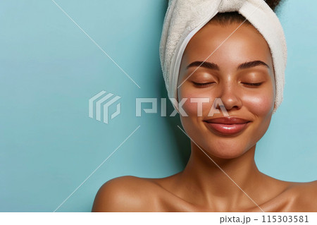 Tranquil Beauty: A Woman Embracing Serenity in Skincare 115303581