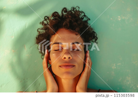 Quiet Renewal: Woman's Contentment in Green Massage Quiet Renewal: Woman's Contentment in Green Massage 115303598