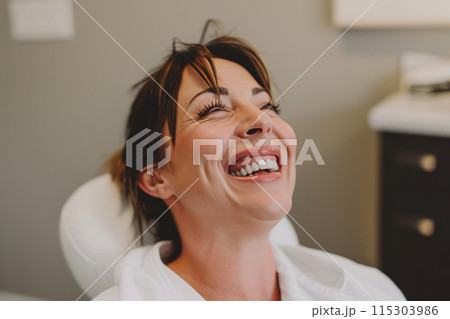 Graceful Renewal: Woman's Joyful Expression in Minimalist Clinic Graceful Renewal: Woman's Joyful Expression in Minimalist Clinic 115303986