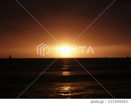 Dramatic Sunset over Pacific Ocean near Waikiki 115304263
