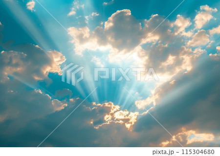 Golden Sun Rays Piercing Azure Sky and Cloudscape Golden Sun Rays Piercing Azure Sky and Cloudscape 115304680